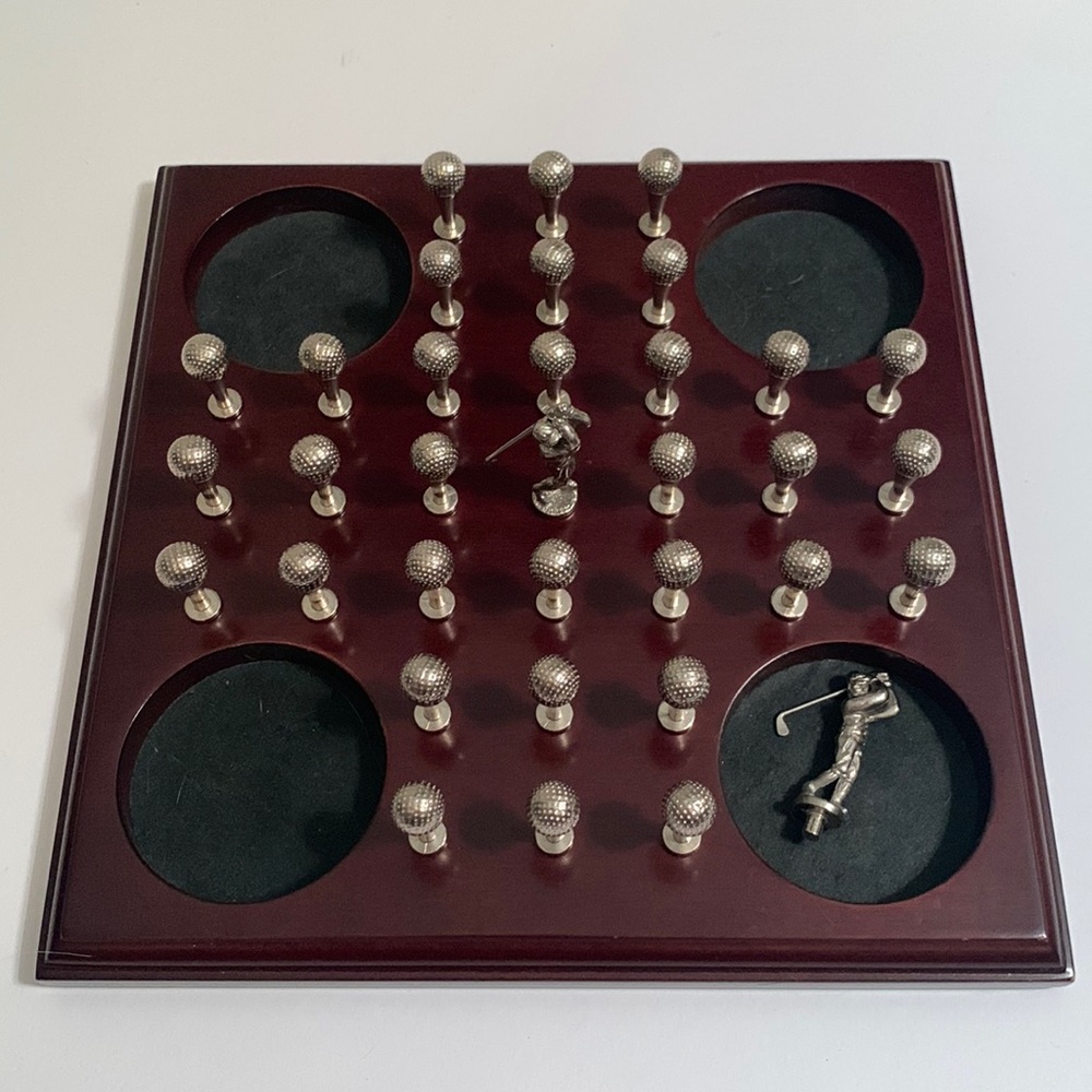 Golf solitaire peg game